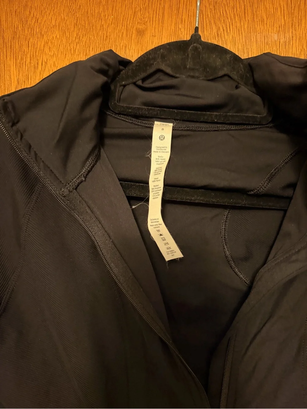 Lululemon athletic running style jacket with built in hood